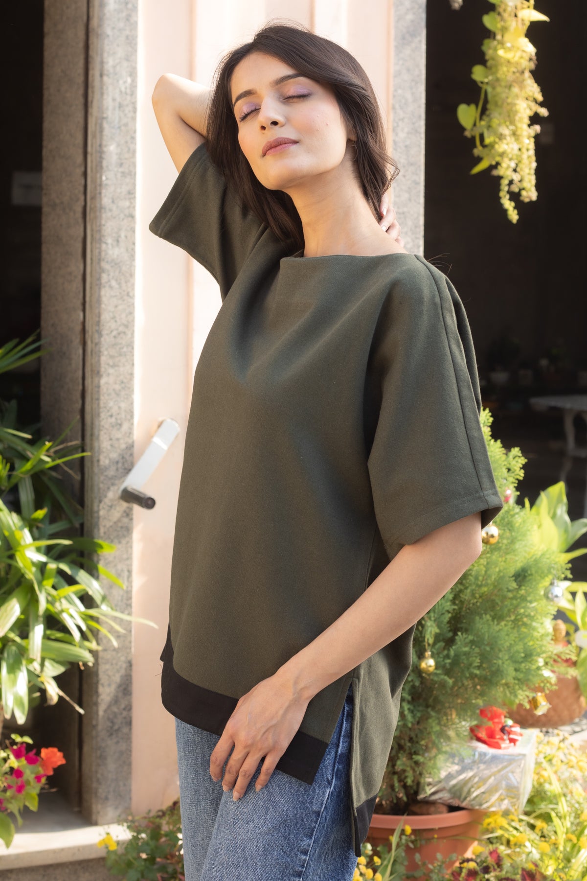 Erica Olive boat neck high-low hem top for winter